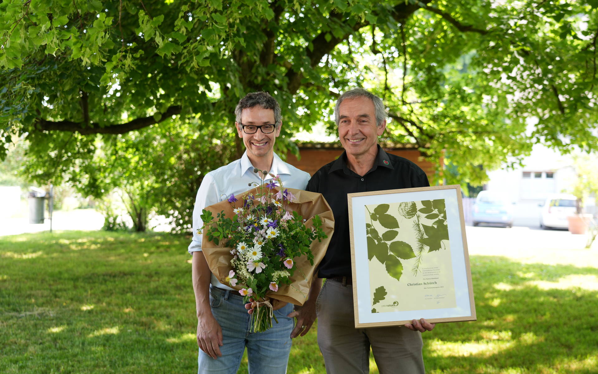 Präsident Andreas Freuler und Preisträger Christian Schürch