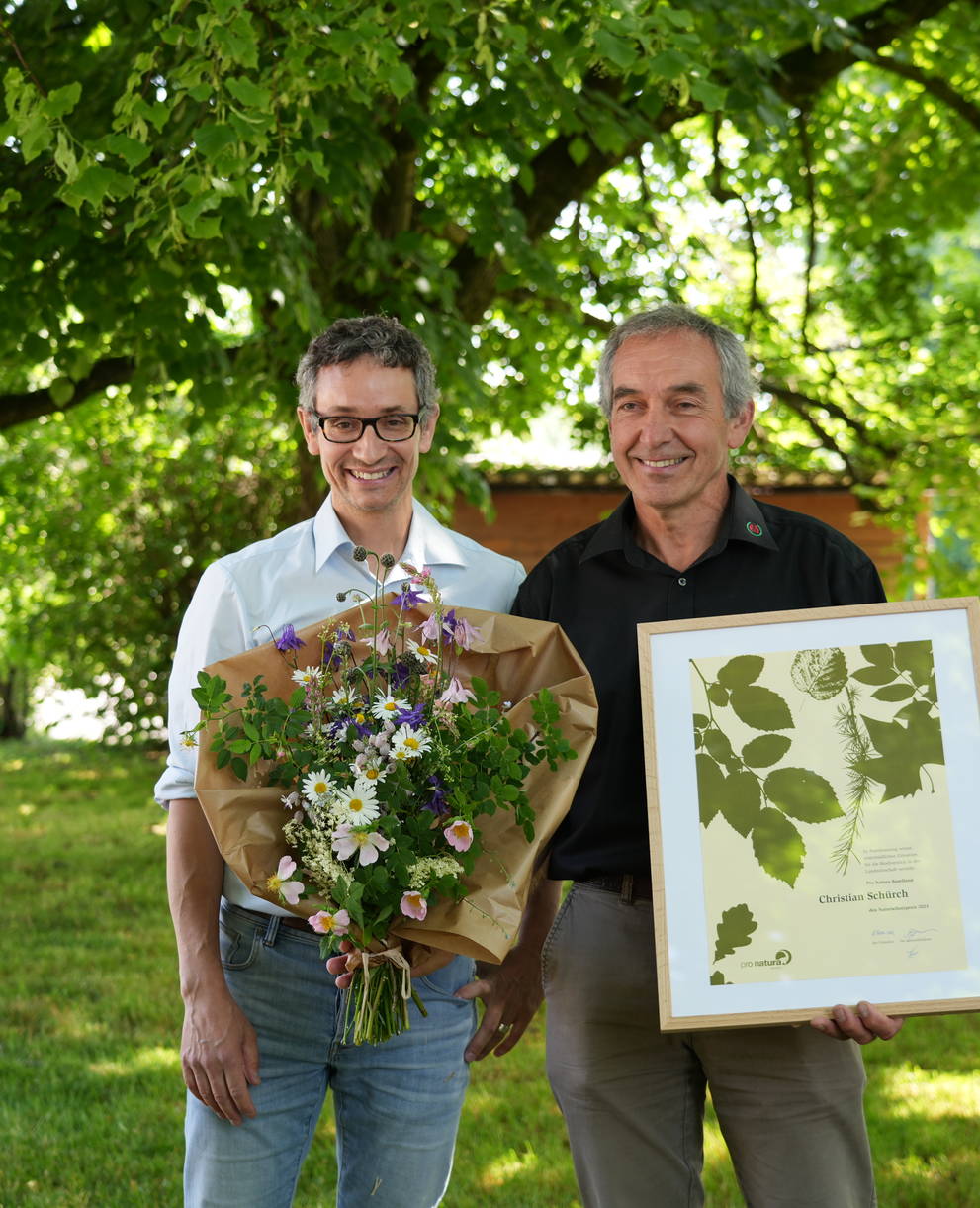 Präsident Andreas Freuler und Preisträger Christian Schürch